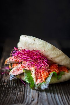 Bao burger with duck and kimchi