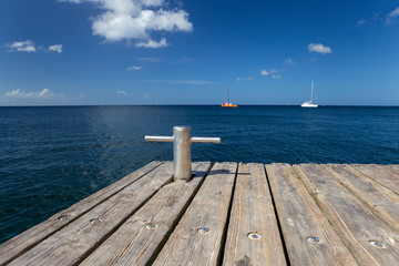 Caribbean sea and wood pier
