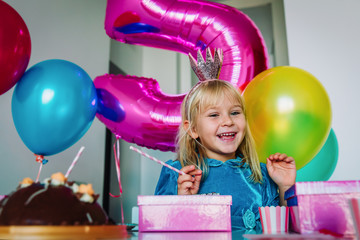 Fototapeta na wymiar happy cute little princess at birthday party