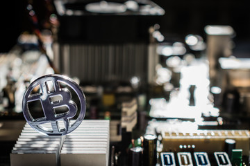 Plastic bit coin with technology and electronic background