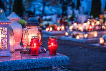 Candles Burning At a Cemetery During All Saints Day. 