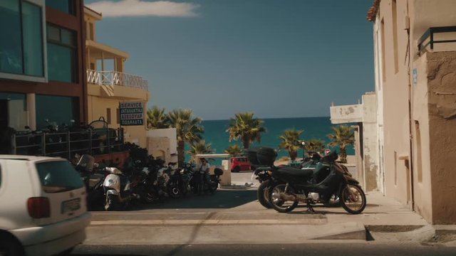 Scooter rental. Motorbikes and scooters on the streets of Crete