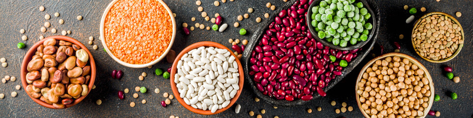 Various assortment of legumes - beans, soy beans, chickpeas, lentils, green peas. Healthy eating...
