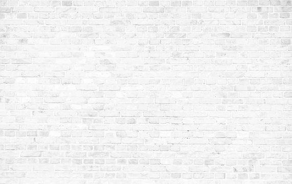Fototapeta Simple grungy white brick wall with light gray shades seamless pattern surface texture background.