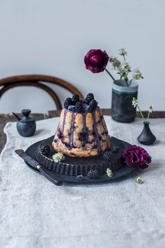 A gugelhupf with teff flour, chickpea flour, blueberries, blackberries, cashews, maple syrup and blueberry powder