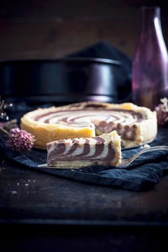 Vegan zebra cake with soya quark on table