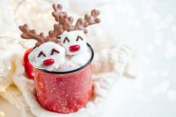 Hot chocolate with melted marshmallow reindeer © azurita