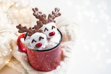 Poster Hot chocolate with melted marshmallow reindeer © azurita