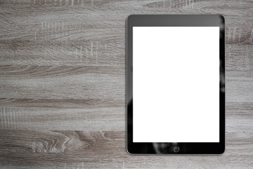 digital tablet wooden table with copy space for background design