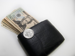 american half dollar coin, 50 c, USA 1/2 dollar, Fifty cent and some dollar bills.