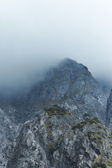 Dramatic Mountain Range With Stormy Clouds In The Sky - Blue Color