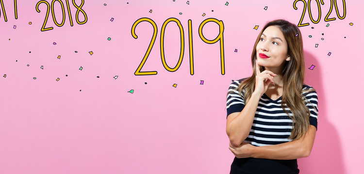 2019 with young woman in a thoughtful pose