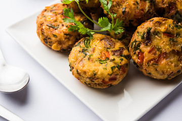 Crispy Corn Tikki, pakora/pakoda or pattice also known as cutlet. served with green chutney. Selective focus