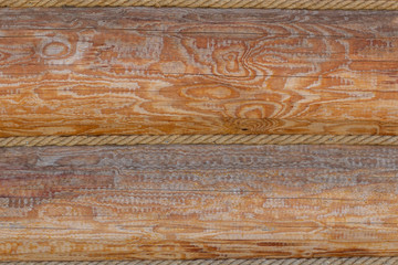 Fototapeta premium Shield with a large number of parallel wooden logs