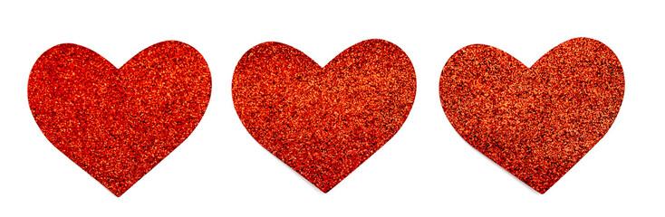 panorama with three red glitter heart in a row isolated on white