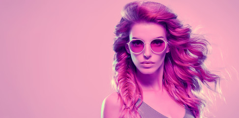 Fototapeta premium Fashion neon light. Girl with glowing Hairstyle