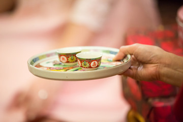 Tea set used in a Chinese wedding tea ceremony. Chinese wedding tea ceremony serving to elders.Chinese Tea ceremony is performed during a  wedding or Chinese New Year.