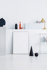 Black cone and ball on a white wall in a daily room interior