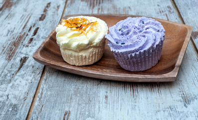 Cupcakes surrounded by rustic background