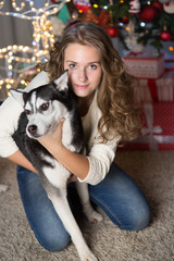 Teen girl with dog for Christmas