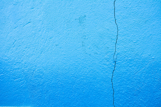 blue crack concrete wall texture at building - background