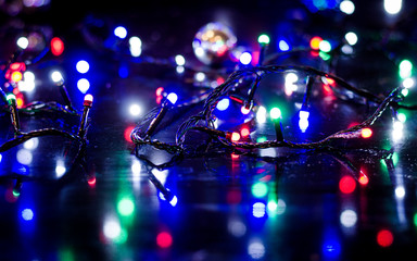 Fototapeta na wymiar Christmas background, garland lights, holiday toys