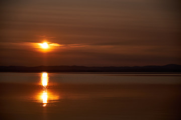 Obraz premium Beautiful sunset on lake. Outdoors. Tranquil Scene.