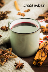 Christmas hot steaming cup of glint wine with spices, cinnamon.