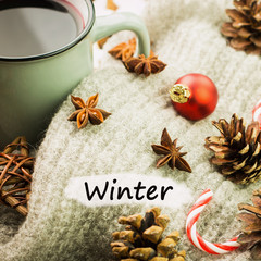 Christmas hot steaming cup of glint wine with spices, cinnamon.