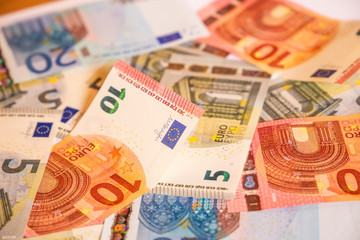 Pile of paper euro banknotes.