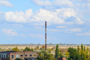 Obraz premium Old abandoned buildings of the former factory and warehouses. The destroyed essential oil plant. Soviet heritage. Old brick buildings. Settlement in the Kuban