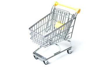 closeup of mini supermarket trolley on white background