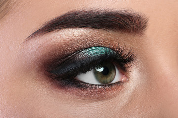 Fototapeta premium Young woman with eyelash extensions and beautiful makeup, closeup view