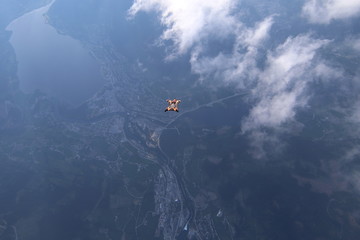 Fototapeta na wymiar Wingsuti skydiving over Norway