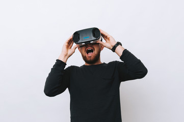 Amazed man having virtual reality experience