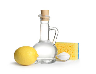 Composition with vinegar, lemon and baking soda on white background. House cleaning