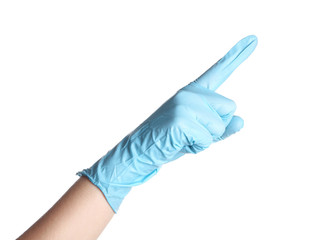 Doctor in medical glove pointing on white background