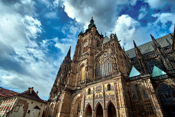 St. Vitus Cathedral in Prague Castle, travel photo with blue cloudy sky
