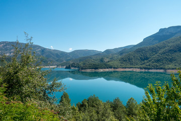 Fototapeta na wymiar Baserca reservoir in the Pyrenees in Summer