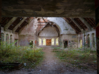 Abandoned church in old British military barracks in Werl, Germany, falling apart and vandalized