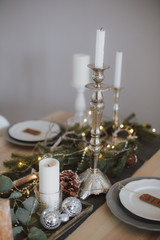 christmas kitchen interior tree decorated by lights gifts toys candles holiday concept