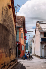 Fototapeta premium Old colourful vintage building at Songkhla Nang Ngam street old town area. Thailand