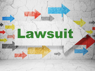 Law concept:  arrow with Lawsuit on grunge textured concrete wall background, 3D rendering