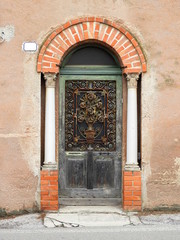 old door in stone wall