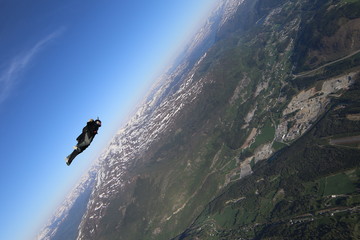 Obraz premium Wingsuit skydiving over Norway