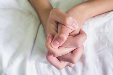 Hands of couple lover sex on the bed,Concept about love, sex and lifestyle.