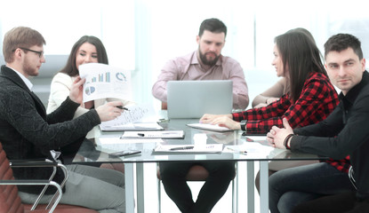 businessman holds a briefing with the business team