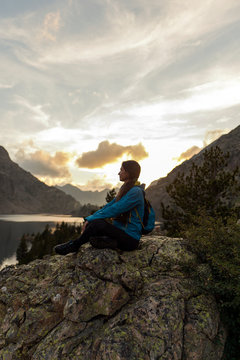 Female hiker in an alpine scenery
