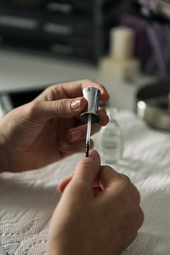 Teenager: Girl Paints Thumbnail With Clear Polish