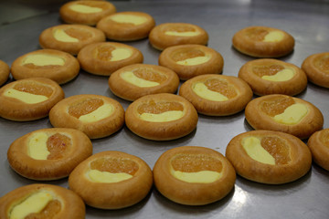 Freshly baked confection in bread and sweets factory